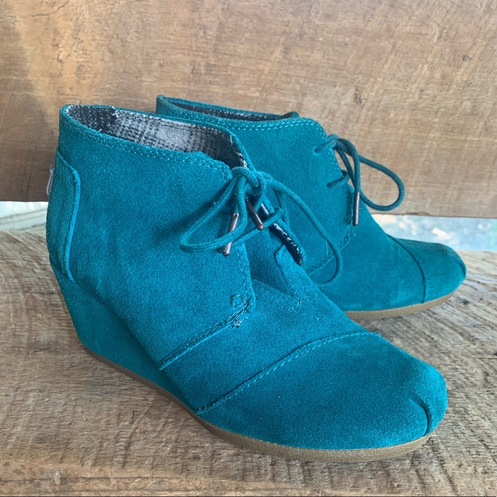 Toms heeled boots size 7.